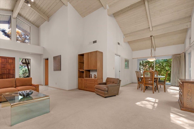 5532 N El Adobe Dr, Fresno, CA 93711 - carpeted living area featuring high vaulted ceiling and a wooden ceiling with exposed beams