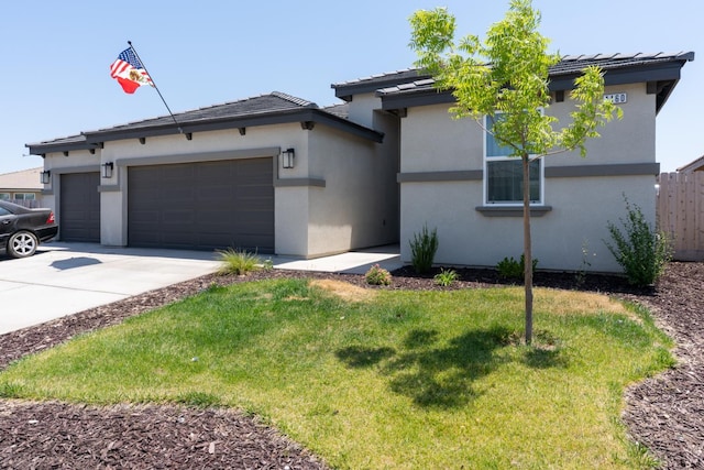 1160 Summit Ct, Madera, CA 93638 - view of front facade with a garage, concrete driveway, and stucco siding