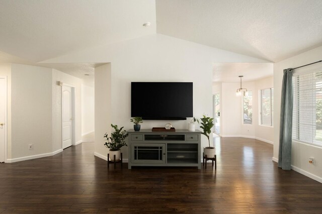 841 Whittier Ave, Clovis, CA 93611 - living area featuring vaulted ceiling and dark wood finished floors
