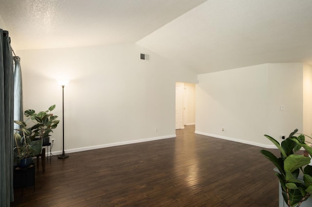 841 Whittier Ave, Clovis, CA 93611 - spare room featuring lofted ceiling and dark wood finished floors