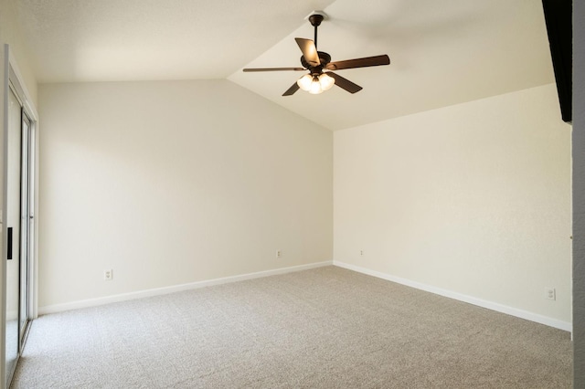 841 Whittier Ave, Clovis, CA 93611 - empty room with a ceiling fan, carpet flooring, and vaulted ceiling