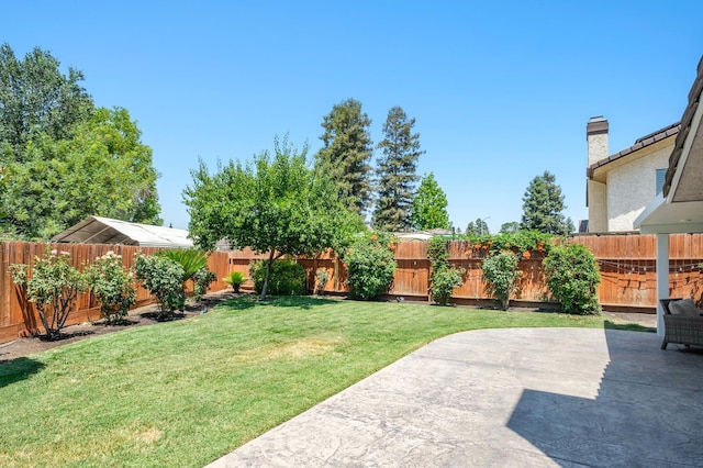841 Whittier Ave, Clovis, CA 93611 - fenced backyard featuring a patio
