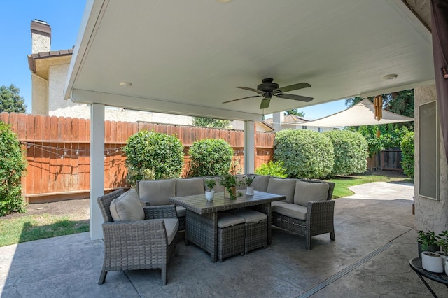 841 Whittier Ave, Clovis, CA 93611 - fenced backyard featuring an outdoor hangout area, a patio, and ceiling fan