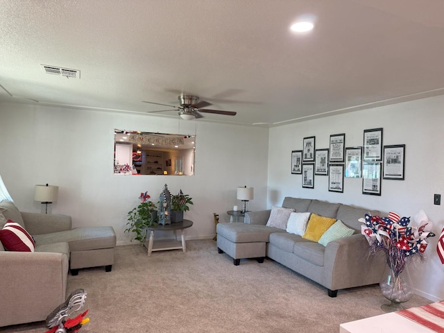 605 E Davis Dr, Dinuba, CA 93618 - living room with light carpet and ceiling fan