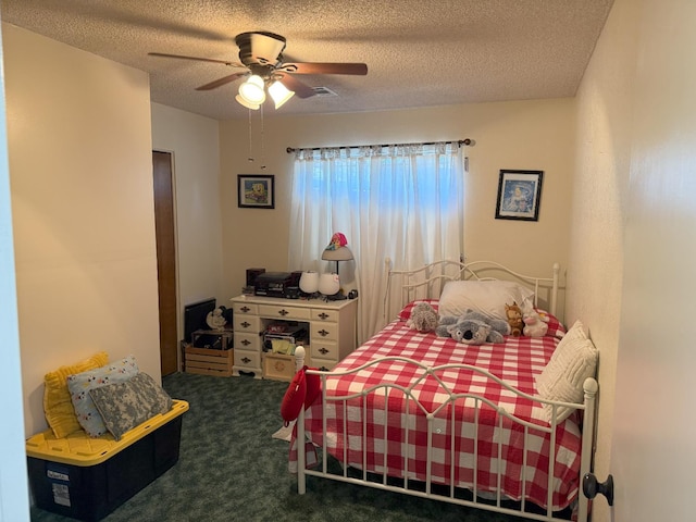 605 E Davis Dr, Dinuba, CA 93618 - bedroom with carpet, a textured ceiling, and a ceiling fan