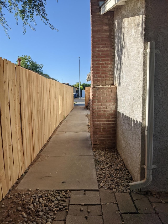 1468 Browning Ave, Clovis, CA 93611 - view of side of home featuring stucco siding