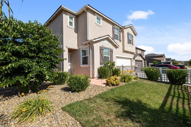 17 Medieval, Merced, CA 95341 - view of home's exterior with an attached garage and stucco siding