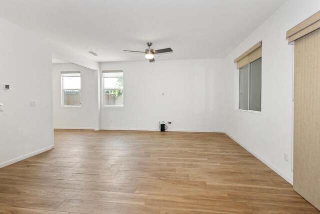 17 Medieval, Merced, CA 95341 - empty room with ceiling fan and light wood-type flooring
