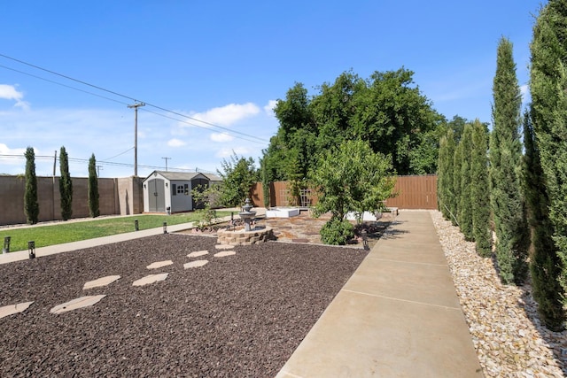 17 Medieval, Merced, CA 95341 - fenced backyard with a storage shed and a patio