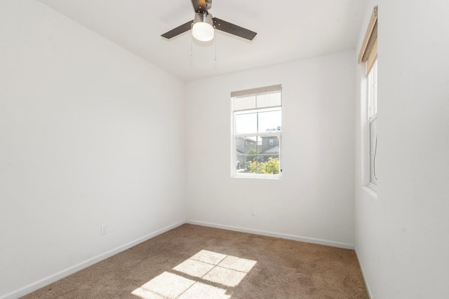 17 Medieval, Merced, CA 95341 - carpeted empty room with baseboards and a ceiling fan