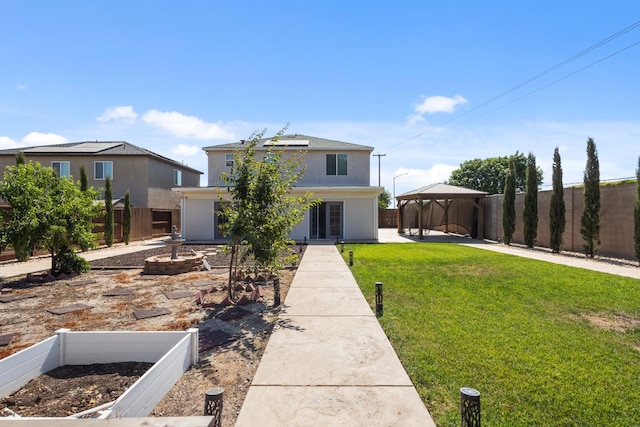 17 Medieval, Merced, CA 95341 - traditional home with a gazebo, a fenced backyard, a patio, stucco siding, and a detached carport