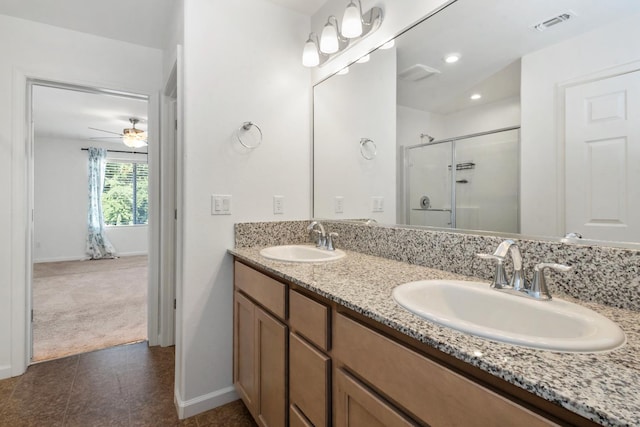 17 Medieval, Merced, CA 95341 - full bathroom featuring double vanity, a stall shower, tile patterned flooring, a ceiling fan, and recessed lighting