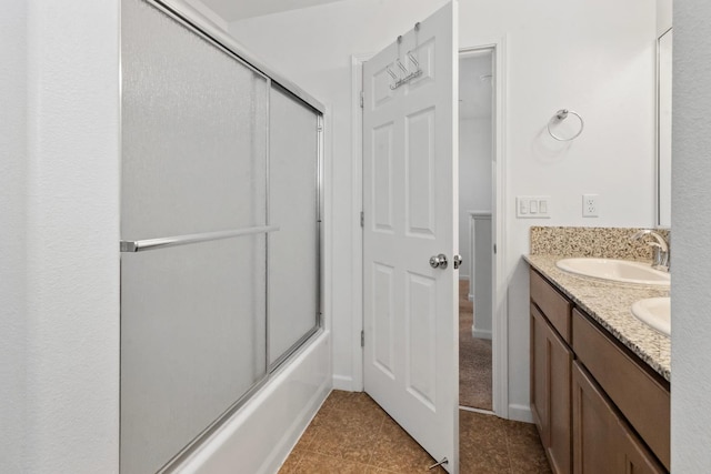 17 Medieval, Merced, CA 95341 - full bath with tile patterned flooring, double vanity, and shower / bath combination with glass door