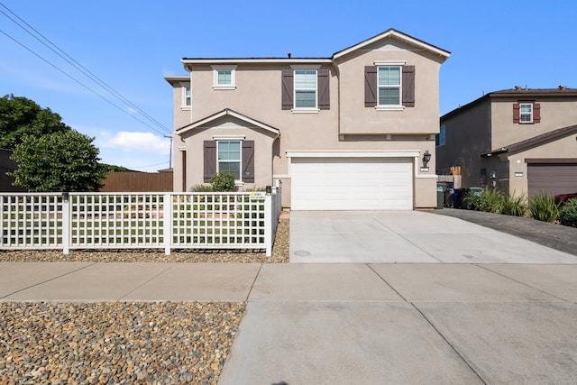 17 Medieval, Merced, CA 95341 - traditional home featuring stucco siding, concrete driveway, and an attached garage