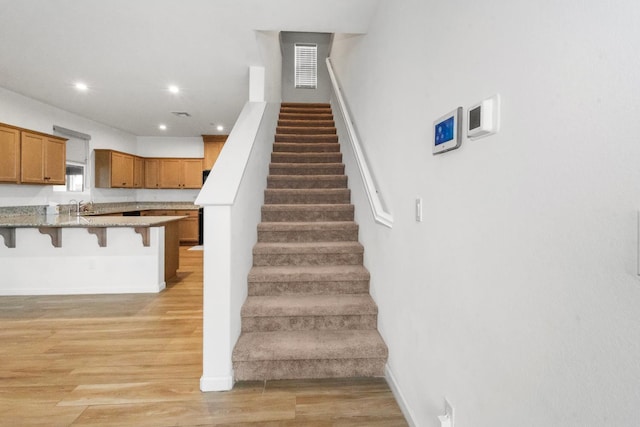 17 Medieval, Merced, CA 95341 - staircase featuring wood finished floors and recessed lighting