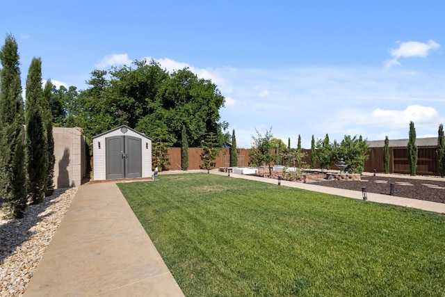 17 Medieval, Merced, CA 95341 - fenced backyard featuring a storage unit