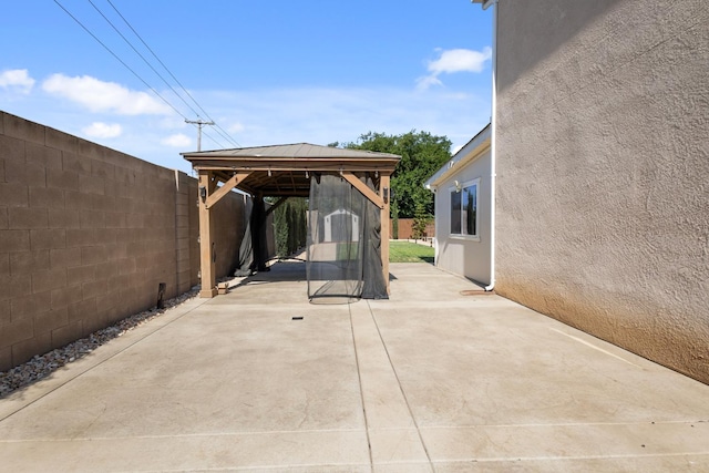17 Medieval, Merced, CA 95341 - fenced backyard with a gazebo and a patio