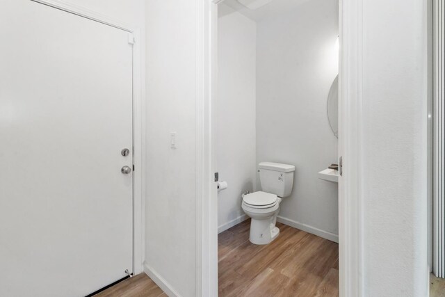 17 Medieval, Merced, CA 95341 - half bath featuring toilet and wood finished floors