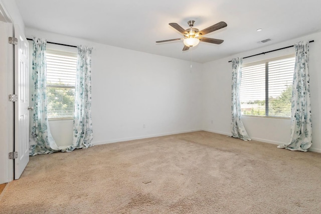 17 Medieval, Merced, CA 95341 - carpeted empty room with ceiling fan and baseboards