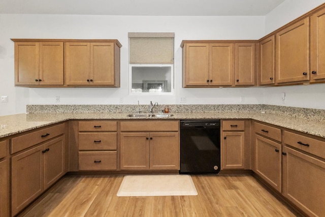 17 Medieval, Merced, CA 95341 - kitchen with black dishwasher, light wood-type flooring, and light stone counters