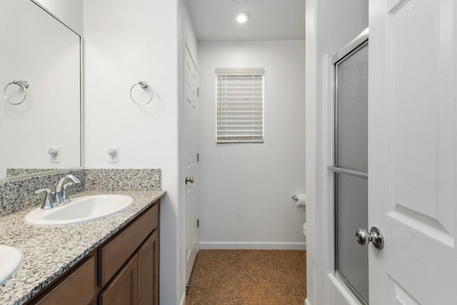17 Medieval, Merced, CA 95341 - bathroom with a shower with shower door, double vanity, and tile patterned floors