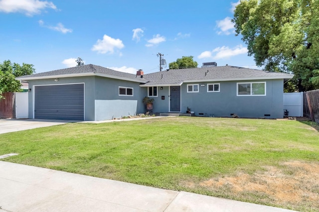 42 W Rall Ave, Clovis, CA 93612 - ranch-style home featuring a garage, driveway, and stucco siding