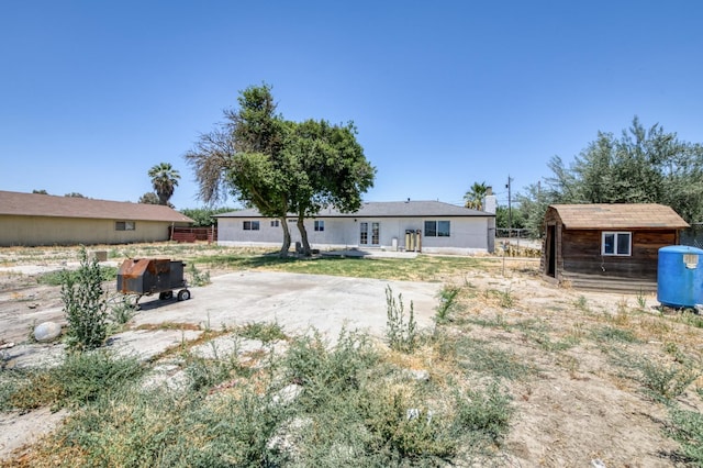 17189 Iona Ave, Lemoore, CA 93245 - back of property with a patio and a shed