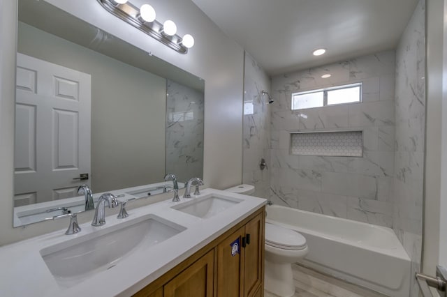 17189 Iona Ave, Lemoore, CA 93245 - bathroom with double vanity and shower / tub combination