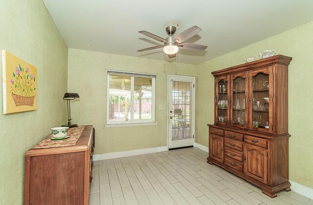 5432 E Swift Ave, Fresno, CA 93727 - doorway with a ceiling fan and light wood-style floors