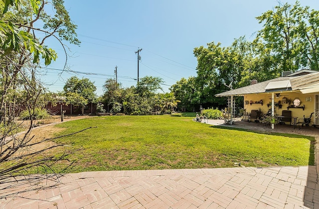 5432 E Swift Ave, Fresno, CA 93727 - view of green lawn with a patio