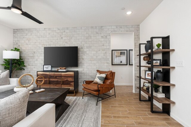 1473 Bloom Ln, Clovis, CA 93619 - living room featuring light wood-style floors, a ceiling fan, and recessed lighting
