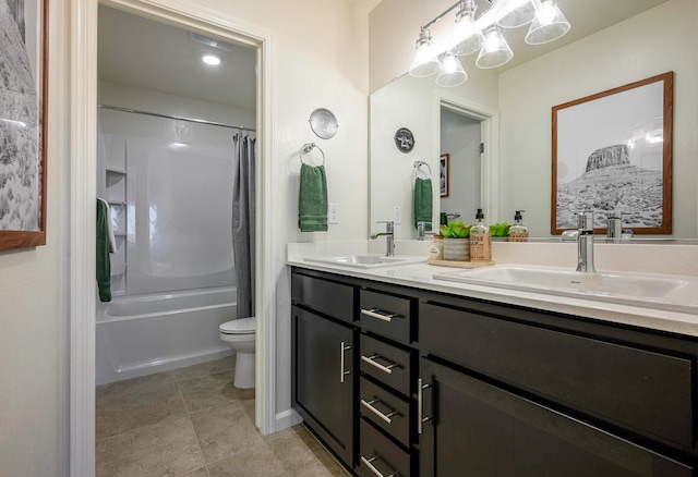 2018 Catherine Ave Unit 2043S, Sanger, CA 93657 - full bathroom featuring double vanity, shower / bath combo with shower curtain, and tile patterned flooring