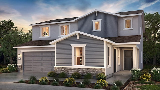 2018 Catherine Ave Unit 2043S, Sanger, CA 93657 - view of front facade featuring an attached garage, stone siding, concrete driveway, and a shingled roof