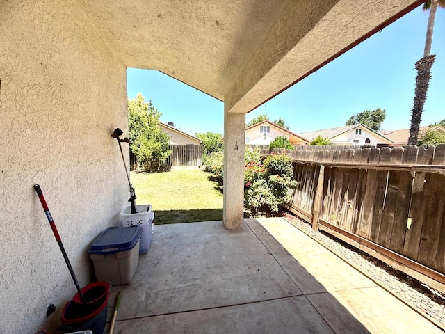 4688 W Weldon Ave, Fresno, CA 93722 - fenced backyard featuring a patio area