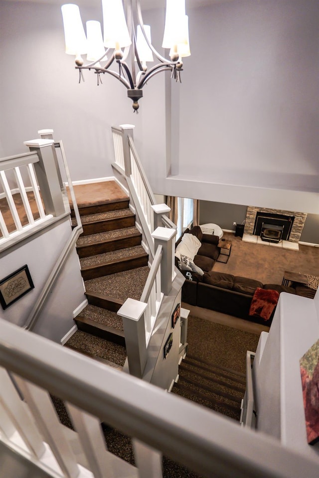 10080 N Dearing Ave, Fresno, CA 93730 - staircase featuring a chandelier and baseboards