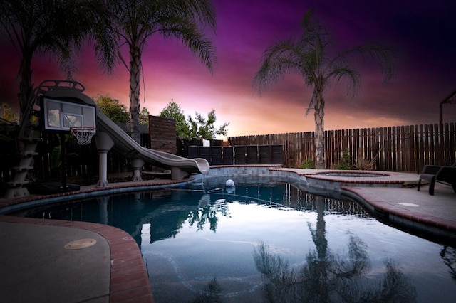 10080 N Dearing Ave, Fresno, CA 93730 - view of swimming pool featuring an in-ground hot tub and a water slide