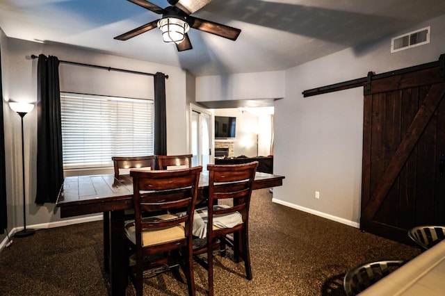 10080 N Dearing Ave, Fresno, CA 93730 - carpeted dining space featuring ceiling fan and a barn door