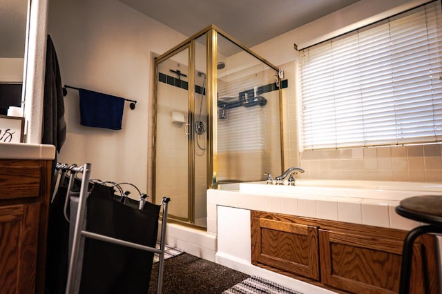 10080 N Dearing Ave, Fresno, CA 93730 - full bathroom featuring tiled shower and vanity