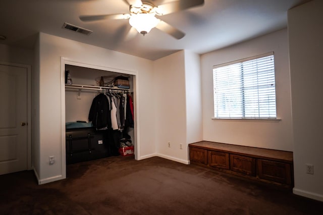 10080 N Dearing Ave, Fresno, CA 93730 - unfurnished bedroom featuring dark colored carpet, a closet, and ceiling fan