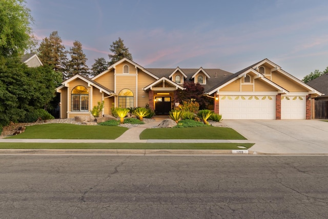 1199 E Cole Ave, Fresno, CA 93720 - view of front of home featuring a front yard, a garage, and driveway