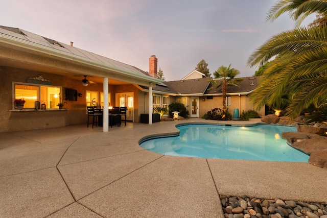 1199 E Cole Ave, Fresno, CA 93720 - swimming pool with a patio area, ceiling fan, and outdoor dining area
