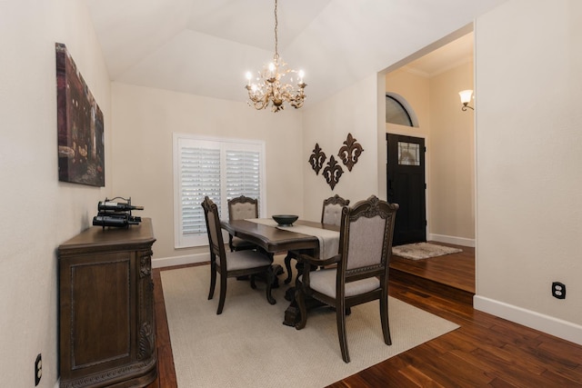 1199 E Cole Ave, Fresno, CA 93720 - dining room with a chandelier and dark wood finished floors