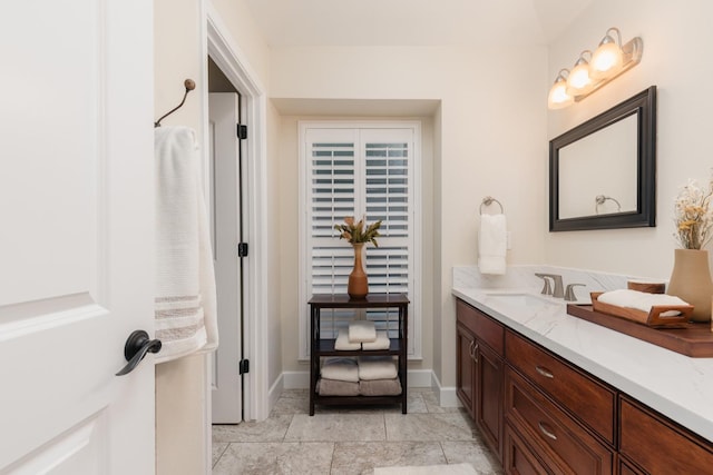 1199 E Cole Ave, Fresno, CA 93720 - bathroom with vanity and baseboards