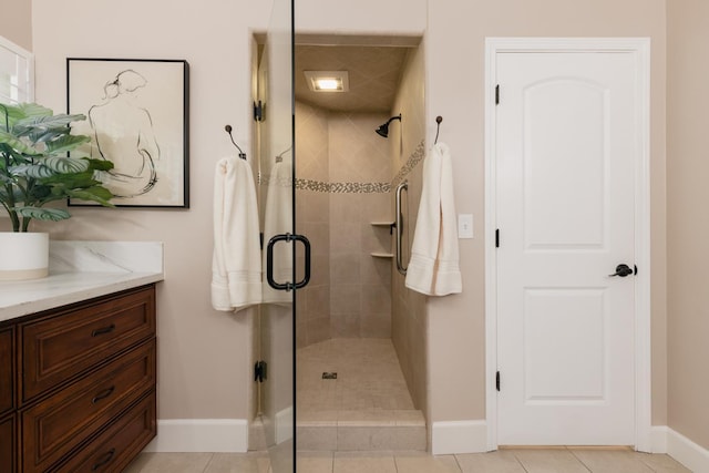 1199 E Cole Ave, Fresno, CA 93720 - full bathroom with a stall shower, vanity, and tile patterned flooring