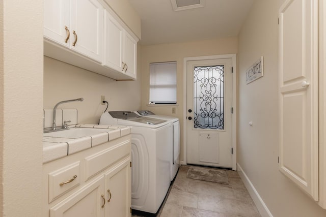 1199 E Cole Ave, Fresno, CA 93720 - washroom with washing machine and clothes dryer and cabinet space