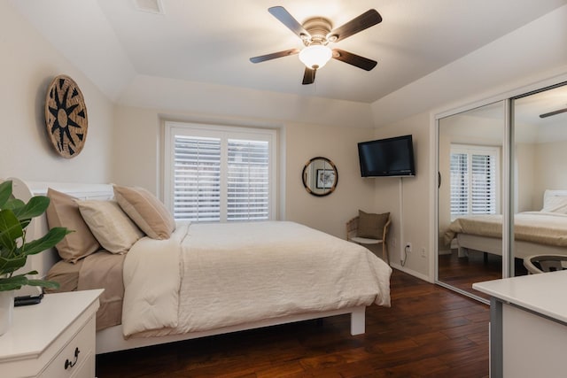 1199 E Cole Ave, Fresno, CA 93720 - bedroom with dark wood-style flooring, multiple windows, ceiling fan, and a closet