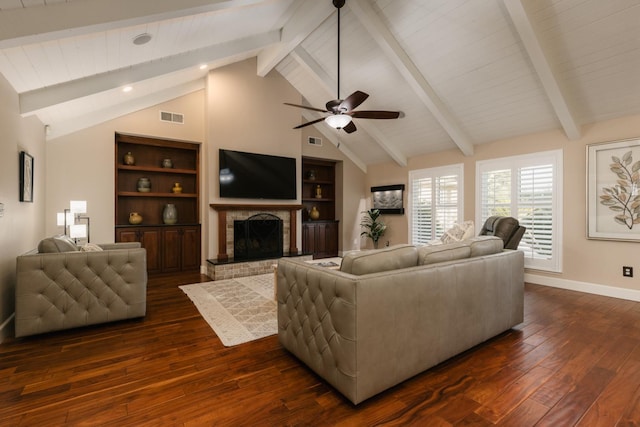 1199 E Cole Ave, Fresno, CA 93720 - living area with dark wood-type flooring, ceiling fan, a brick fireplace, and recessed lighting