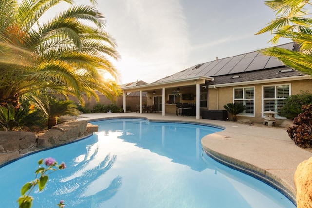1199 E Cole Ave, Fresno, CA 93720 - swimming pool with a patio area, ceiling fan, and outdoor dining space