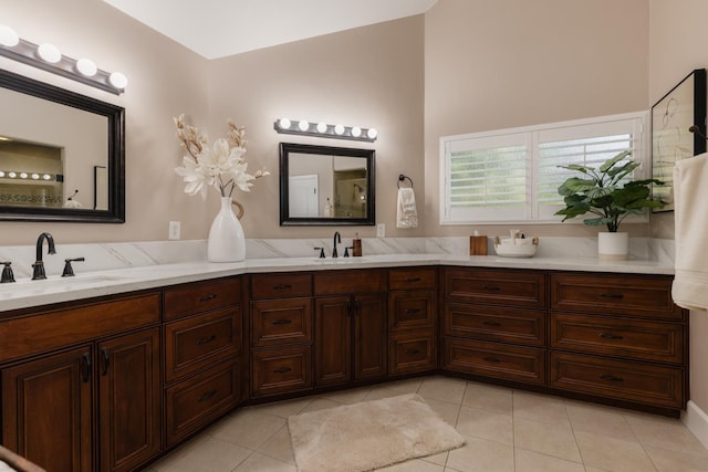 1199 E Cole Ave, Fresno, CA 93720 - full bathroom with double vanity, tile patterned floors, and lofted ceiling