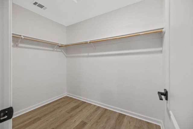 2540 E Seeger Ave, Visalia, CA 93292 - spacious closet featuring wood finished floors
